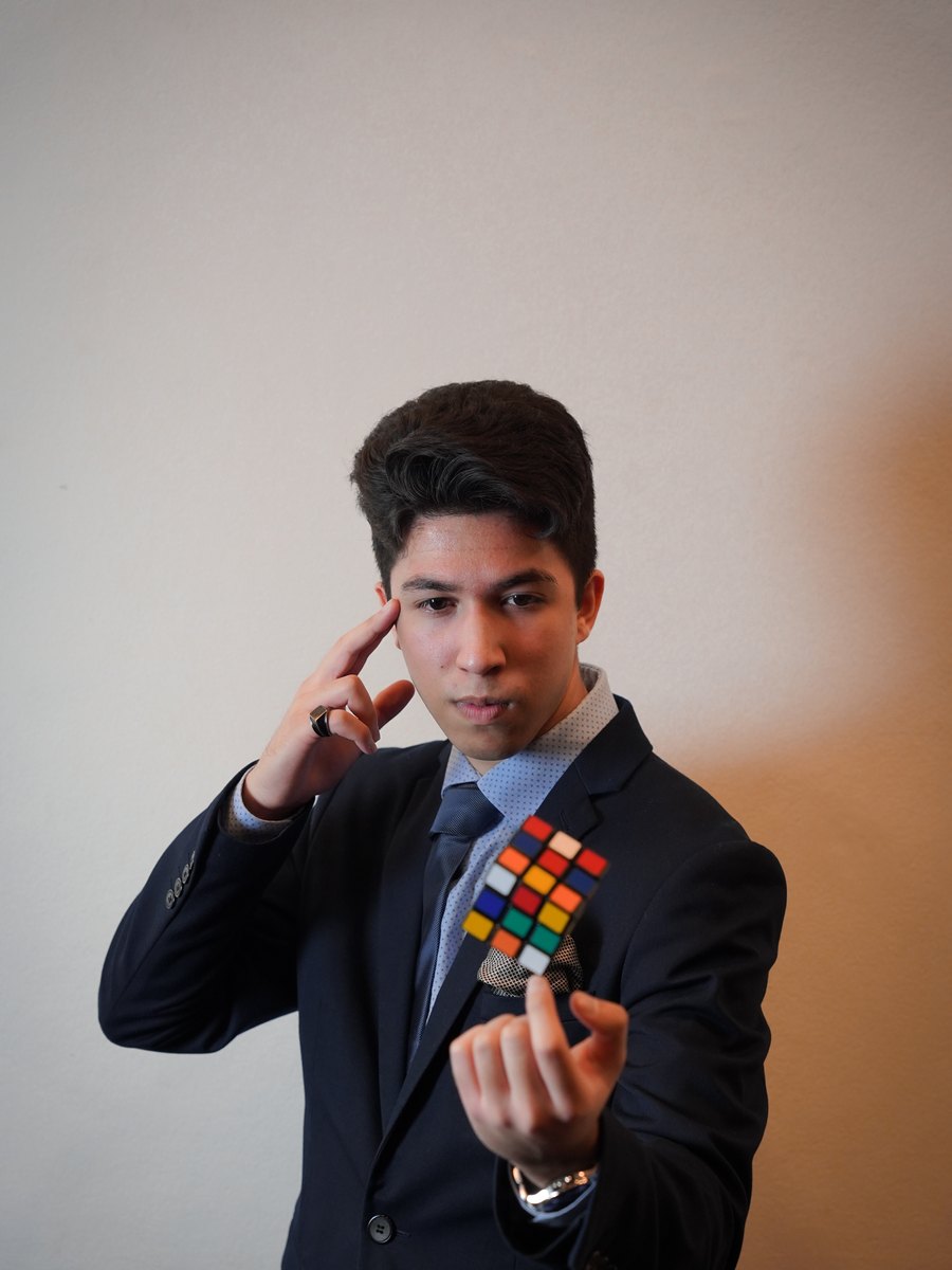 Studio portrait of TDog with playing cards